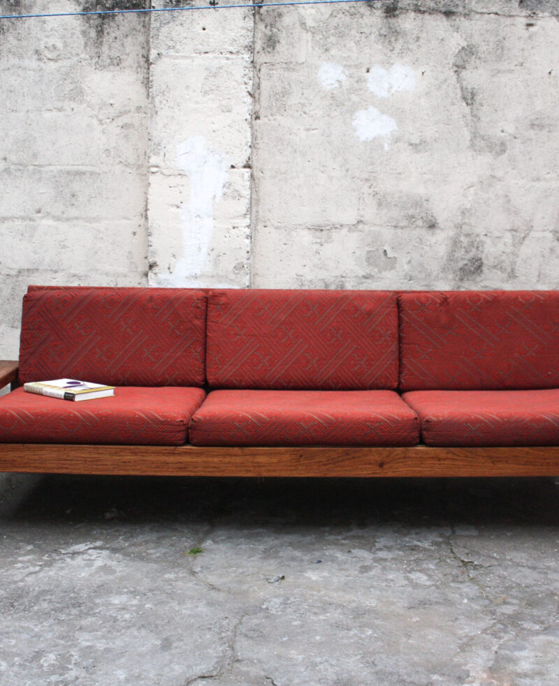 red mid centry sofa